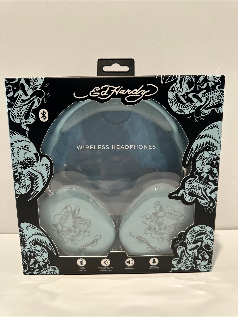 Ed Hardy Blue & White Wireless Headphones with Built-in Microphone.